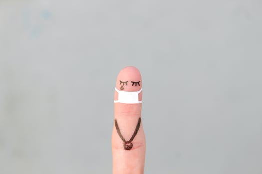 Fingers art of lonely woman with face mask on walk. photo
