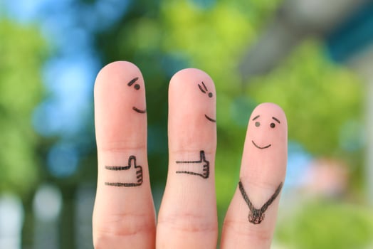 Fingers art of happy family. Concept parents are proud of their child. photo