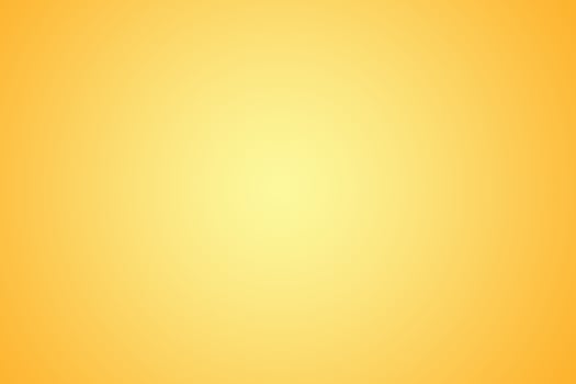 abstract yellow or orange background with light gradient center. photo