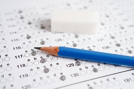 Answer sheets with pencil drawing fill to select choice, education concept. photo