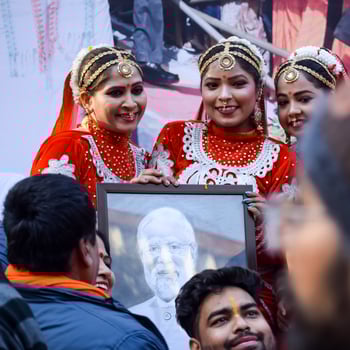 New Delhi, India - January 16 2023 - Thousands of people collected during Prime Minister Narendra Modi BJP road show, people during PM Modi big election rally in the capital photo