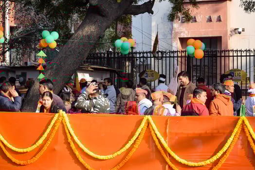 New Delhi, India - January 16 2023 - Thousands of people collected during Prime Minister Narendra Modi BJP road show, people during PM Modi big election rally in the capital photo