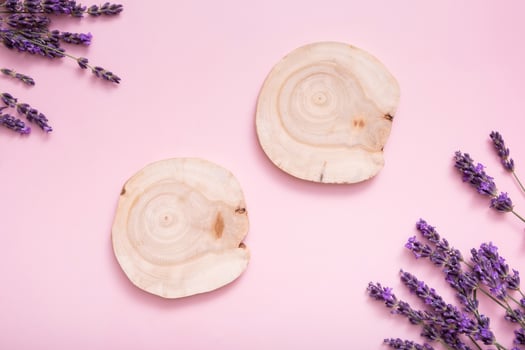 Podium, stage or pedestal with lavender flowers top view. Mock up for cosmetic products photo