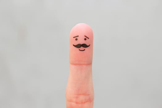 Finger art of happy man with a mustache. photo