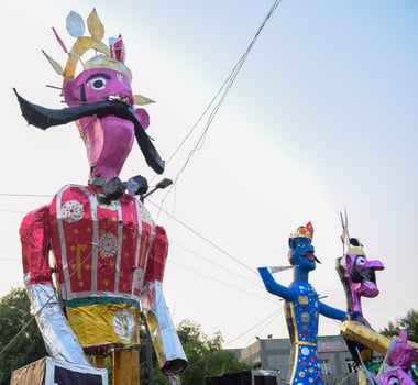 Ravnans being ignited during Dussera festival at ramleela ground in Delhi, India, Big statue of Ravana to get fire during the Fair of Dussera to celebrate the victory of truth by Lord Rama photo