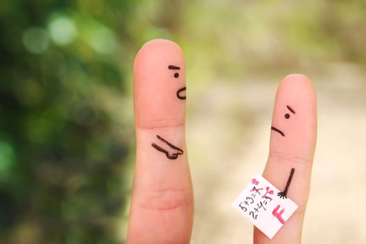 Fingers art of people. Concept of boy got a bad grade, man scolding child. photo
