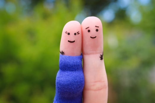Fingers art of happy couple. Woman is pregnant. photo