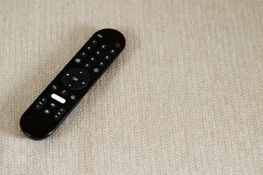 close up Television remote control at home photo