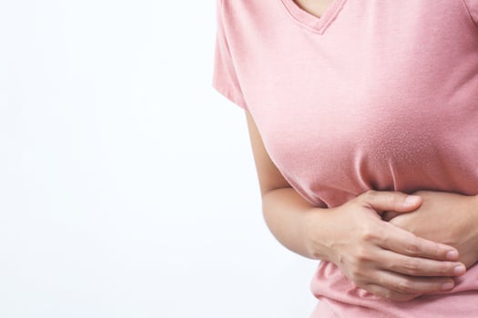 Woman having a stomachache, or menstruation pain. suffering from abdominal. Menstrual cramps. Healthcare and medical, gynecology concept. photo