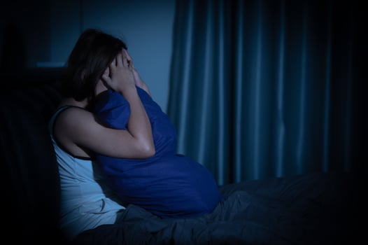 Asian women have a high concern that is why she can't sleep.Have stress from work photo