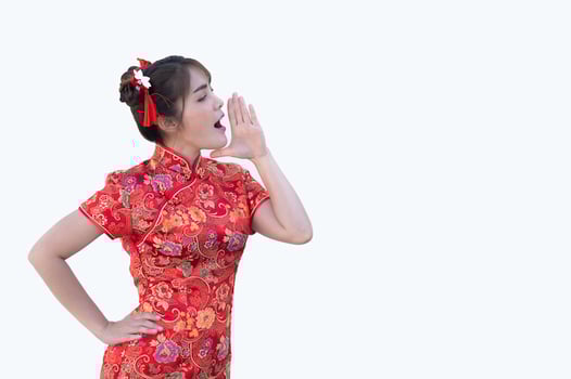 Portrait beautiful asian woman in Cheongsam dress,Thailand people,Happy Chinese new year concept,Happy  asian lady in chinese traditional dress photo