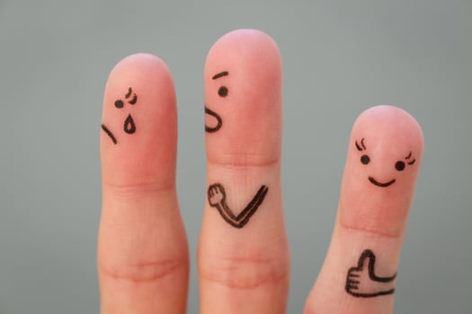 Fingers art of couple during quarrel. Another woman is happy. photo