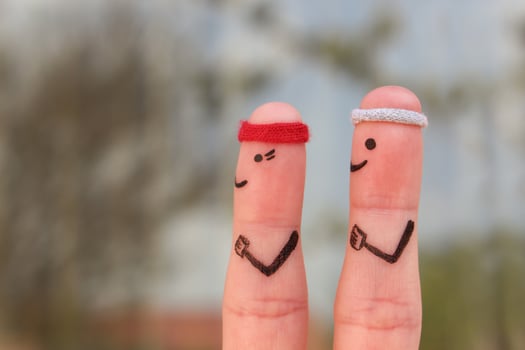 Fingers art of a Happy couple in sports. Concept of men and women are running. photo