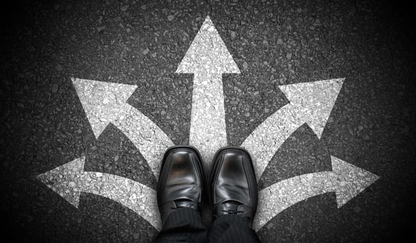 Black Business Shoes and Five Chalky Arrows on Asphalt - Choice Concept photo