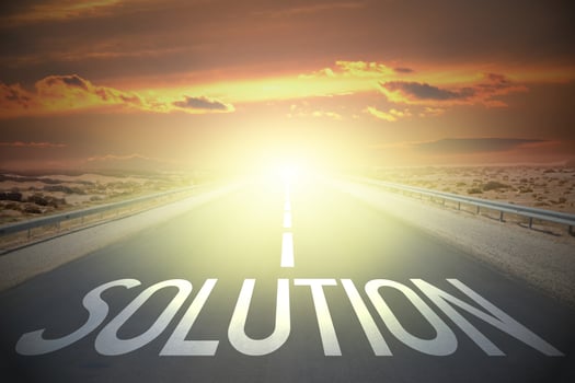 Solution word on a road and sunset sky photo