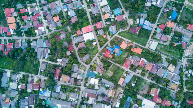 Aerial view of residential houses and driveways. photo