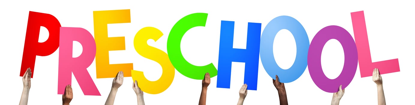 Preschool - Human Hands Holding Colorful Letters photo