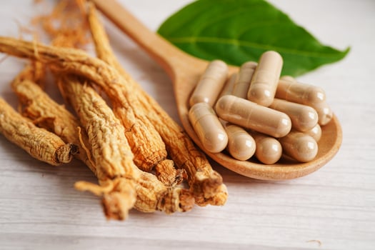 Ginseng roots and green leaf, healthy food. photo