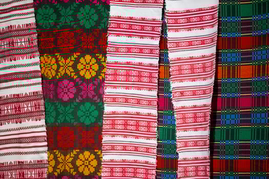 Slavic embroidered towels. National Ukrainian or Belarusian ethnic patterns on the fabric. photo