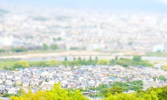 blur image of cityscape with bokeh in miniature effect for background usage. photo