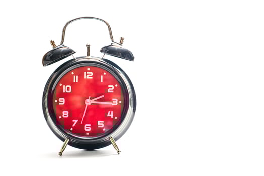 Vintage red and black alarm clock photo