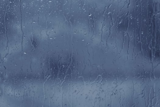 glass of window at rain photo