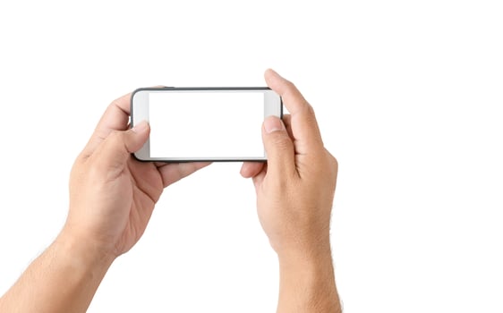 Two hands holding  smart phone with blank white screen photo
