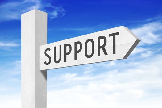 Support - White Wooden Signpost with one Arrow photo