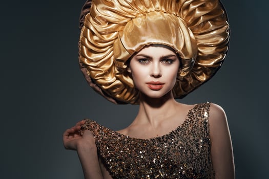 pretty woman in big golden hat vintage lifestyle glamor photo