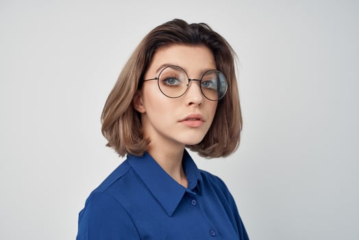 woman blue shirts fashion posing emotions light background photo