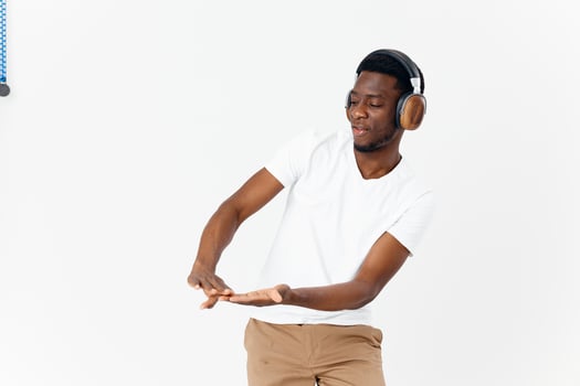 African American wearing headphones music light background studio entertainment photo