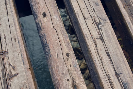 wooden bridge over the river top view close-up travel photo