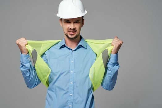 man in white helmet blueprints builder isolated background photo