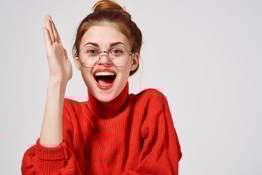 portrait of a woman in a red sweater Lifestyle Studio fun model photo