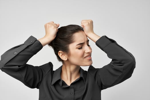 woman in black shirt headache discontent trouble health problems photo