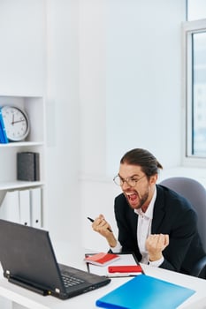 businessman phone laptop work emotions technologies photo