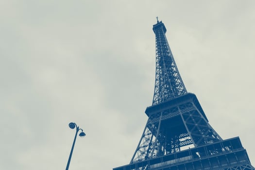 view on Eiffel tower and street lamp in Paris photo