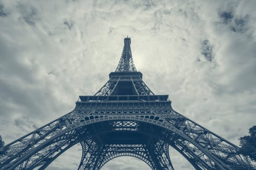 Eiffel tower in Paris against clouds photo
