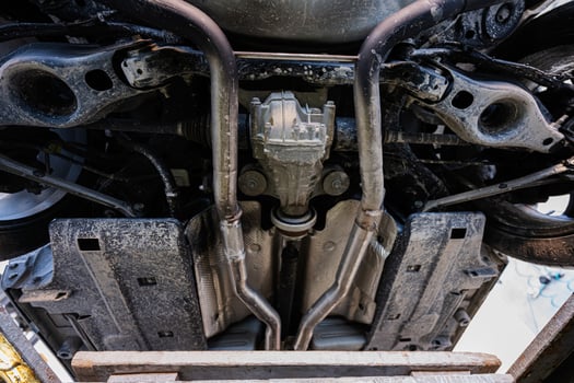 Service repair station working with muscle car.  Bottom view of pickup car photo