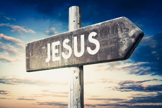 Jesus - Wooden Signpost with one Arrow, Sunset Sky in Background photo