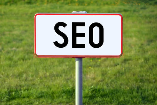SEO - White Sign on a Grass photo