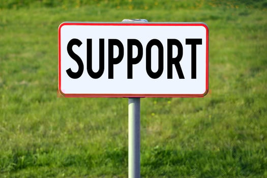 Support - White Sign on a Grass photo