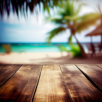 Old wooden table top on blurred beach background with coconut palm leaf. Concept Vacation, Summer, Beach, Sea - image photo