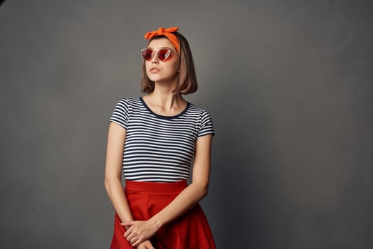 pretty woman in striped t-shirt red skirt posing fashion summer style photo