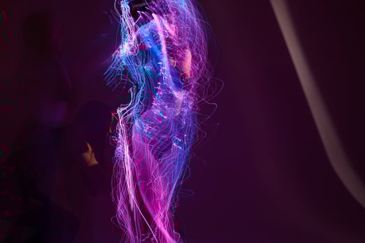 Beautiful fashionable girl neon lines posing model glamor studio model unaltered photo