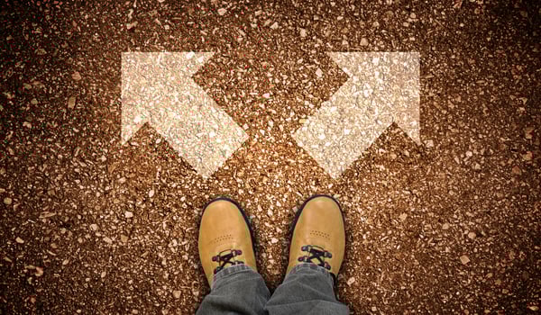 Yellow Leather Shoes and Two Right and Left Chalky Arrows on Ground - Choice Concept photo