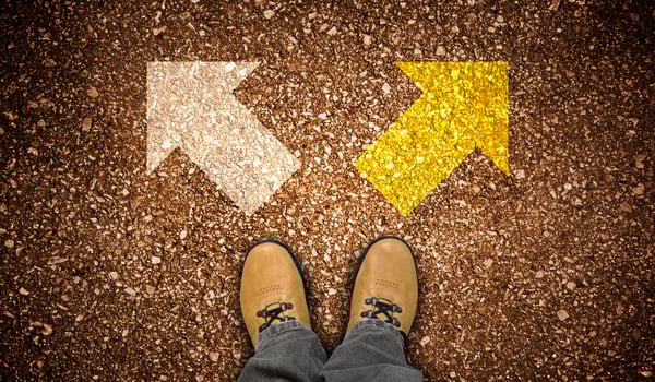 Yellow Leather Shoes and Two Right and Left Chalky Arrows on Ground - Choice Concept photo
