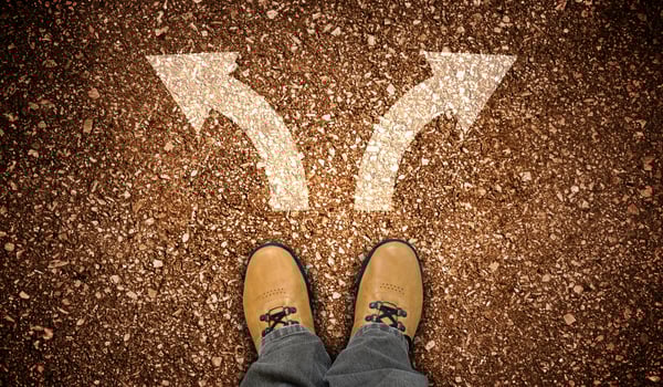 Yellow Leather Shoes and Two Right and Left Chalky Arrows on Ground - Choice Concept photo