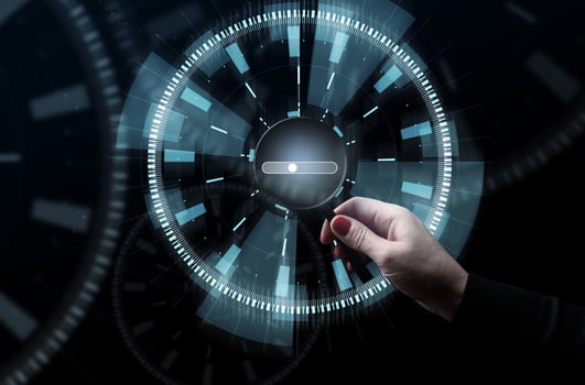 A woman's hand holds a magnifying glass and a virtual bar for entering and posting information photo