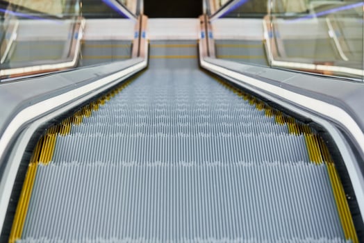 Escalator in shopping center photo